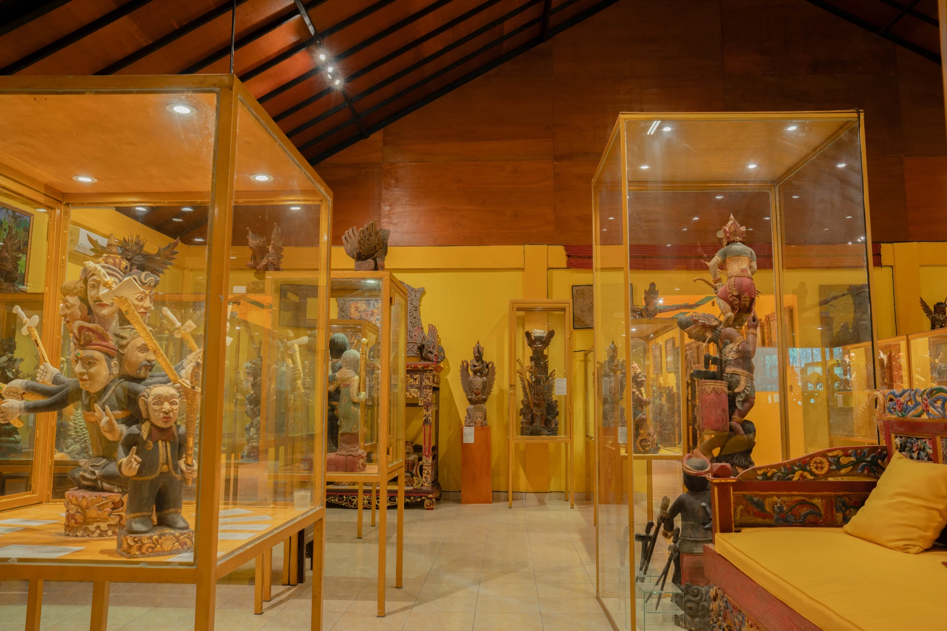 Zoom out Framed archival sketches and historical documents on the vibrant red walls of the Mads Lange Bedroom.