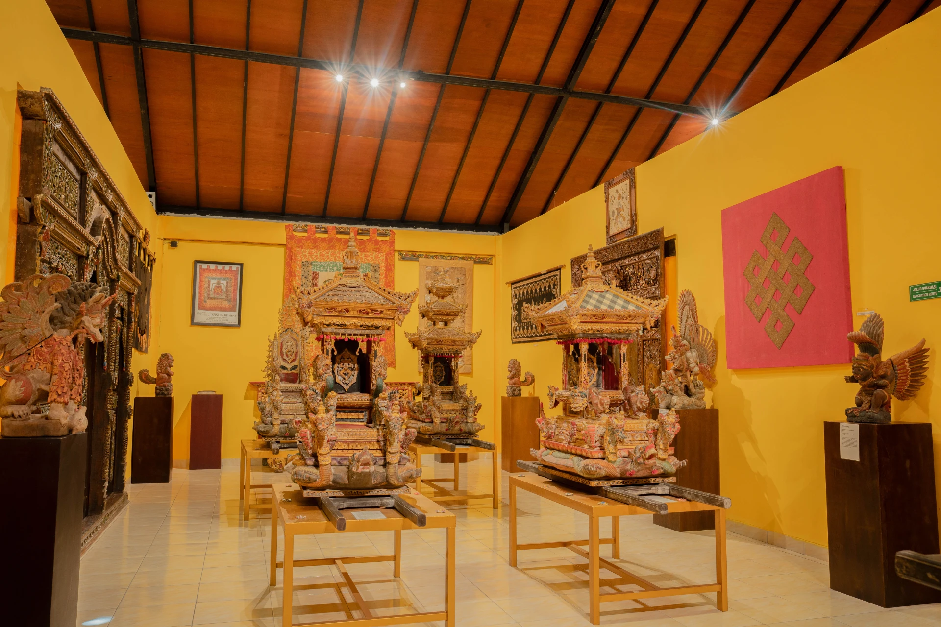 Interior of Annemarie Kipar Room at Museum Peter Bloch Collection, featuring a vintage wooden and her framed portrait.