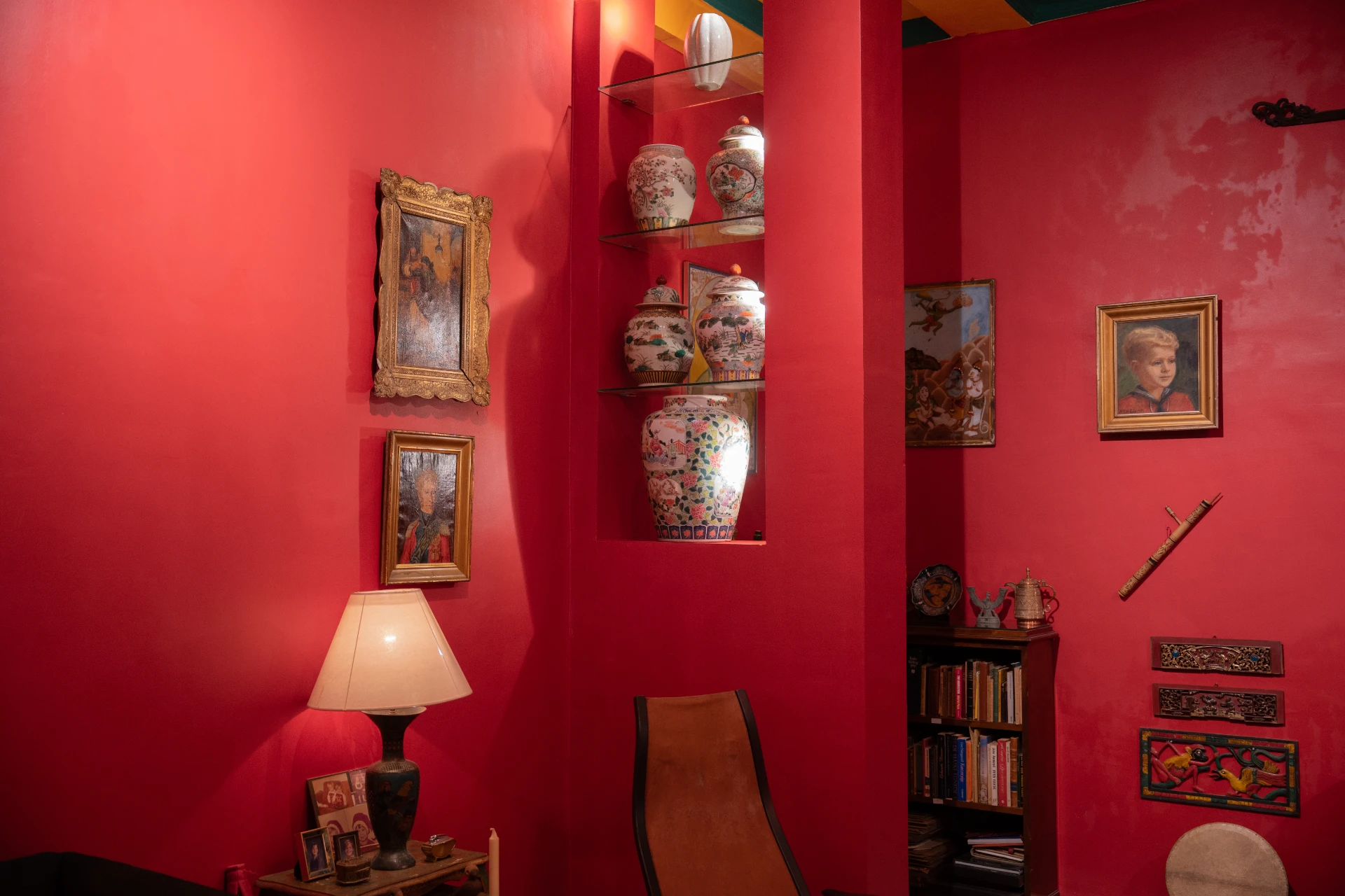 Framed historical portraits of VOC officials and colonial-era maps in the VOC Room, Museum Peter Bloch Collection.
